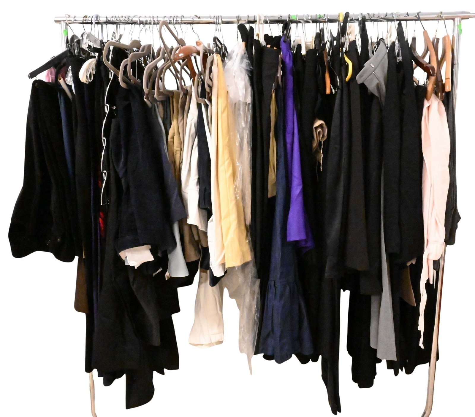 Group of Approximately 70 Women's Clothing Articles: Group of Approximately 70 Women's Clothing Articles to include pants in various colors and designs, casual pants, and skirts, brands such as: Columbia, Banana Republic, sizes vary most 10-12