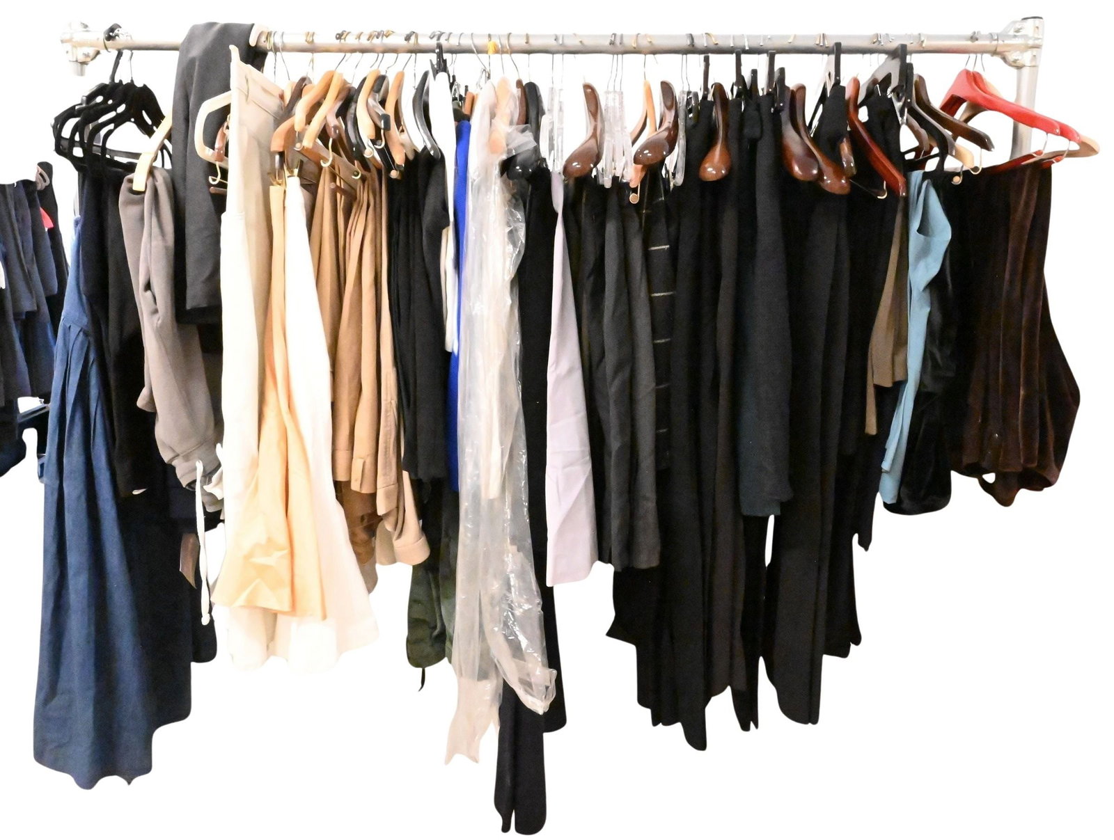Group of Approximately 100 Women's Pants and Skirts: Group of Approximately 100 Women's Pants and Skirts to include various colors and brands such as: Yves Saint Laurent, St. Tropez, etc. sizes 4-12