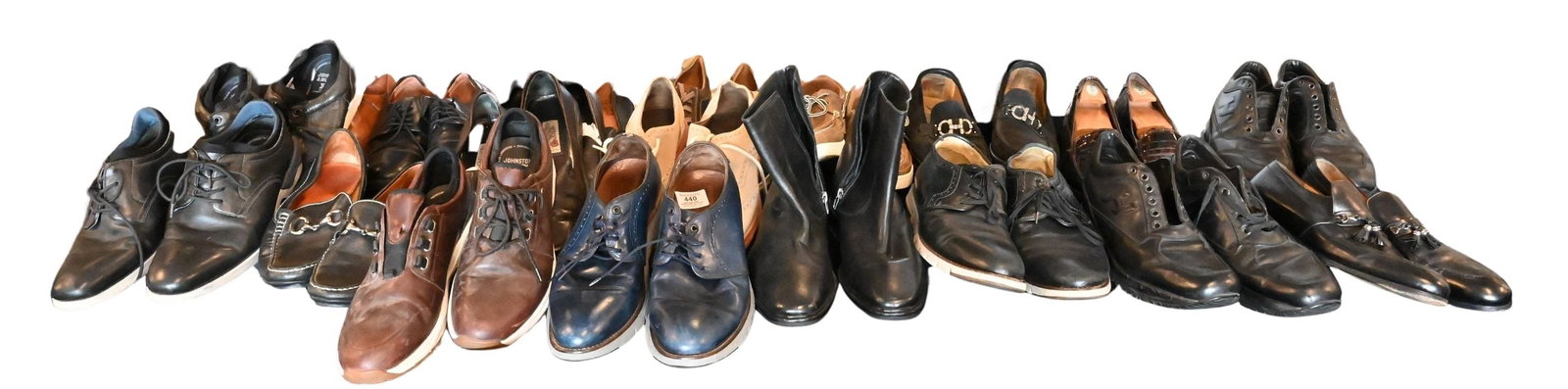 Approximately 18 Pairs of Mens Footwear: Approximately 18 Pairs of Mens Footwear to include loafers, dress shoes, and boat shoes, brands such as: Johnston & Murphy, J & M, and Sege Valentino sizes 8, 9, 9.5, etc.