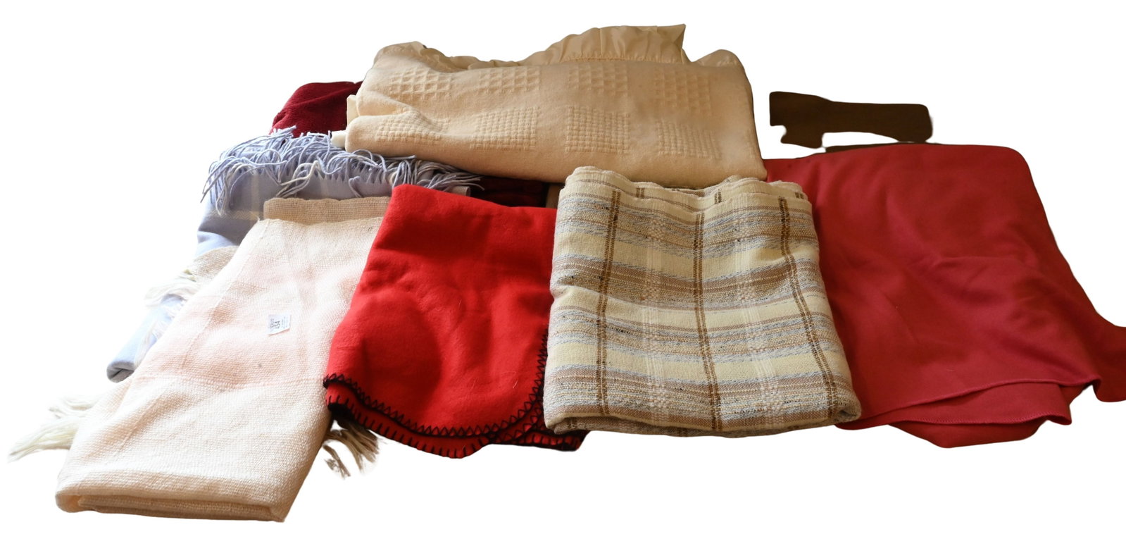 Group of Throws and Blankets: Group of Throws and Blankets To include pink Lana Vigen, a brown baby Alpaca, white Faribault Woolen Mill, woven and fleece throws, blended fabric blankets in solid and multicolor examples, some