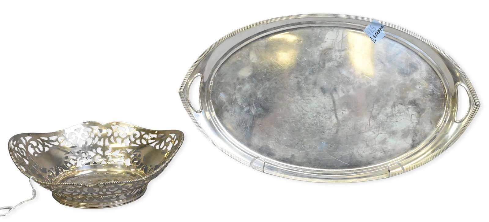 Dutch Silver Tray and Bowl: Dutch Silver Tray and Bowl to include oval handled tray and pierced bird motif bowl, both having Dutch purity marks for 835 silver longest 13 inches, 20.3 troy ounces Provenance: From a Briarcliff