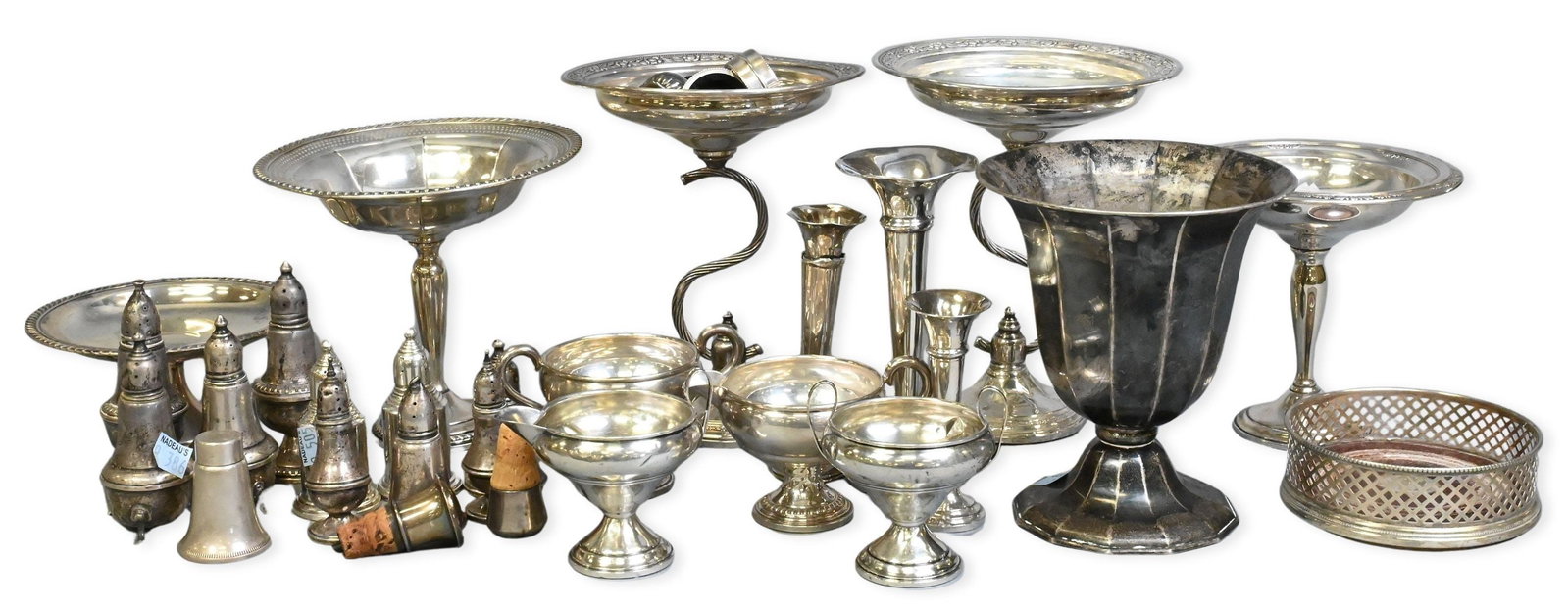 Large Group of Weighted Sterling Silver: Large Group of Weighted Sterling Silver to include compotes, sugar and creamer bowls, vases, and salt / pepper shakers tallest 8 1/2 inches