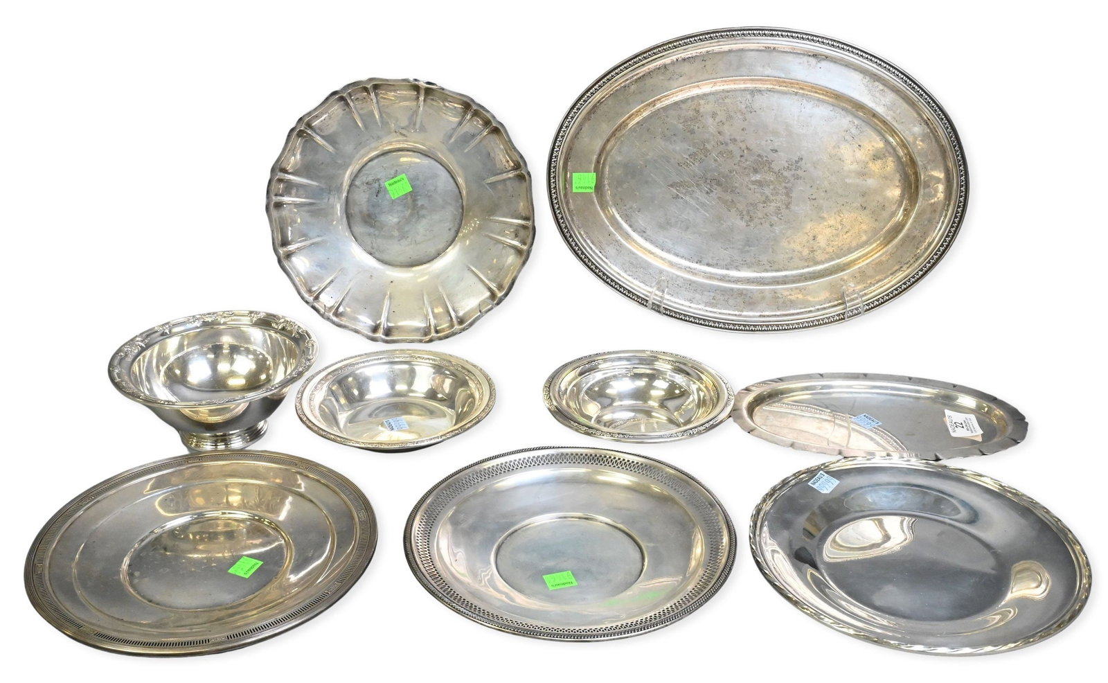 Nine Piece Sterling Silver Tray and Bowl Group: Nine Piece Sterling Silver Tray and Bowl Group to include trays and bowls of various sizes and makers largest 14 inches total weight 62.4 troy ounces