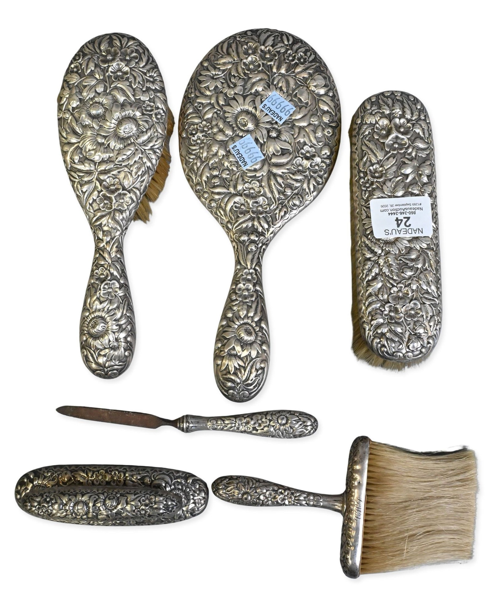 6 Piece Weighted Sterling Silver Repousse Dresser Set: 6 Piece Weighted Sterling Silver Repousse Dresser Set to include 3 brashes, mirror (missing mirror), file, and blottom (missing blatter) height 11 inches