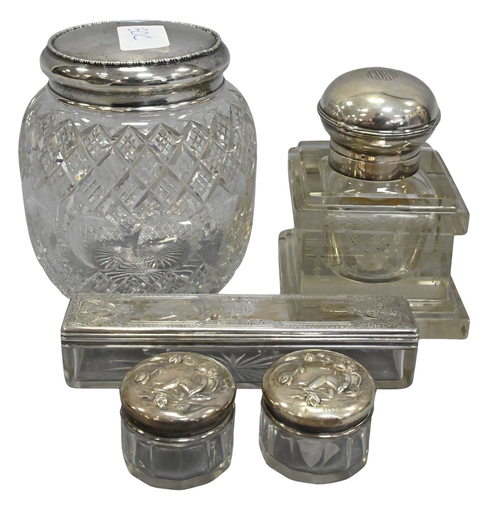 Four Piece Sterling Silver and Glass Group: Four Piece Sterling Silver and Glass Group to include several silver topped inkwell top broken, sterling silver lidded jar, rectangular box and a pair of circular boxes height 6 1/2 inches, total