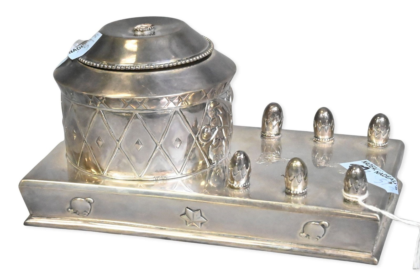 Continental Silver Inkwell: Continental Silver Inkwell having rectangular base, central covered inkwell (broken finial present) and pen rest height 3 inches, width 7 inches, depth 4 1/2 inches, 14.9 troy ounces Provenance: From