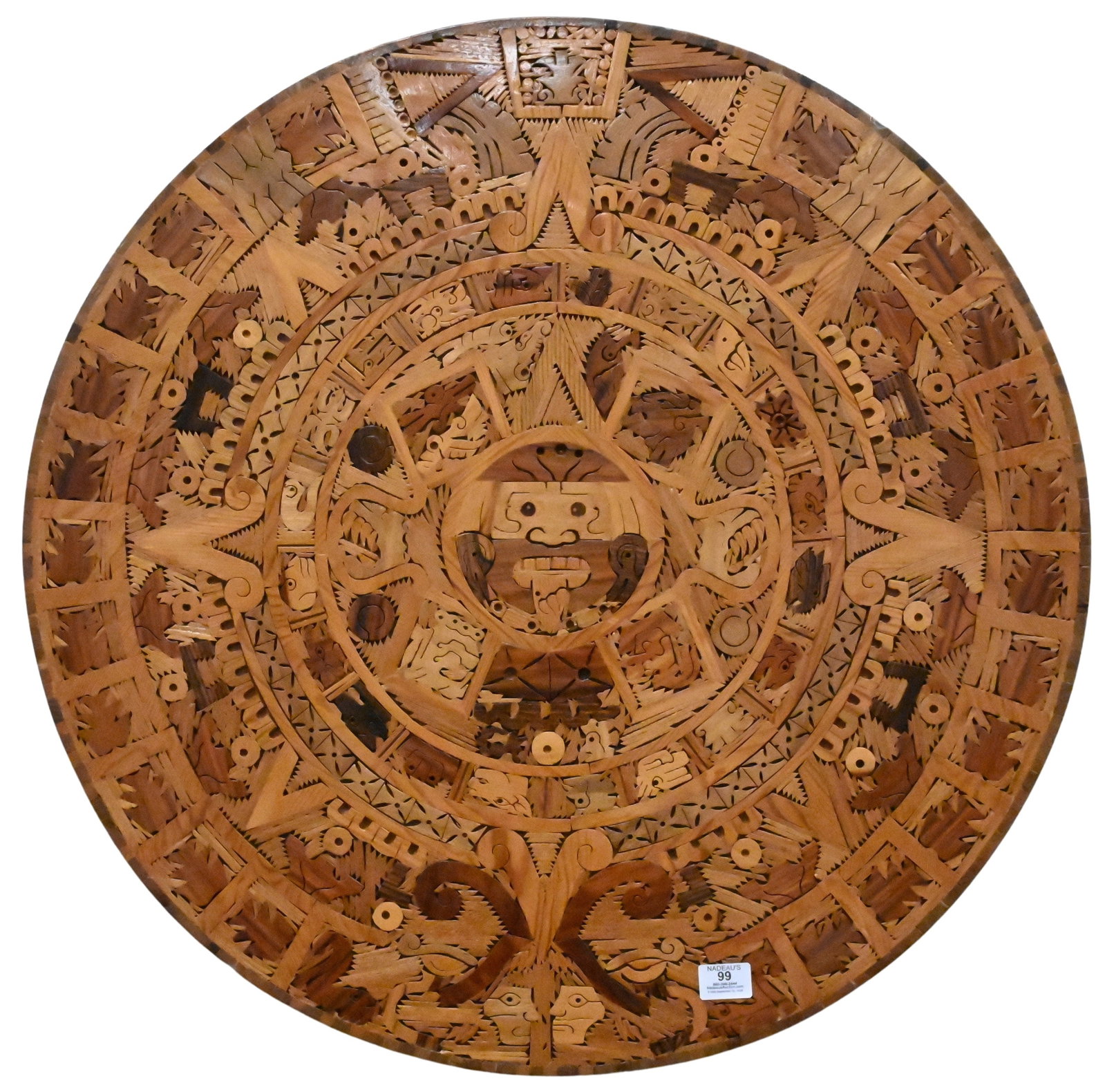 Alfonso Jurado e Hijos (Mexican, 20th Century): Alfonso Jurado e Hijos (Mexican, 20th Century) "Sunstone-Aztec Calendar" Inlaid wood carving constructed from approximately 3,000 individually fitted pieces of various tropical woods. Description