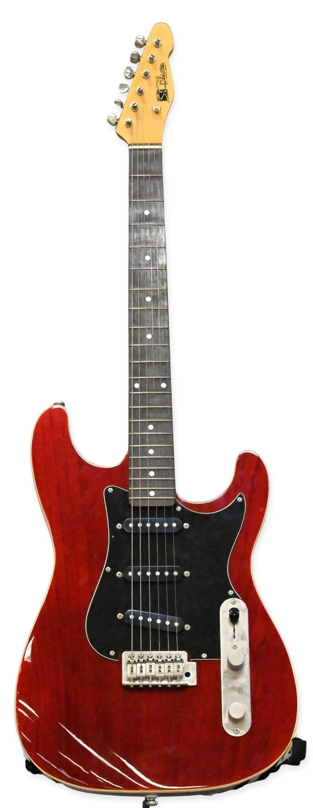 St. Blues Bluesmaster Electric Guitar: St. Blues Bluesmaster Electric Guitar having red finish, serial number ST05060041. Along with original hard case.