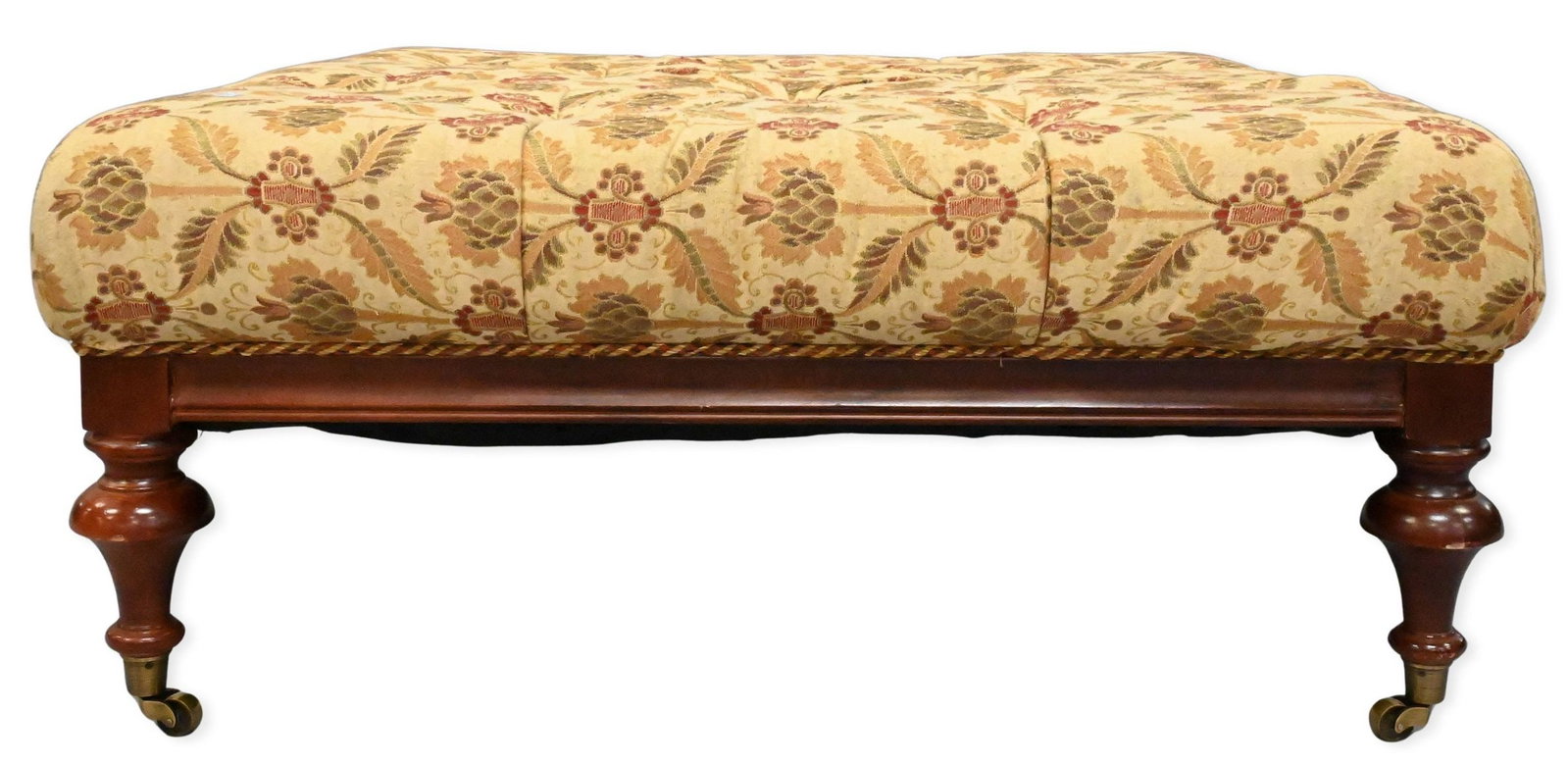 Custom Upholstered Tufted Ottoman: Custom Upholstered Tufted Ottoman set on tall turned legs ending in brass casters height 18 inches, top 41 1/2" x 41 1/2"