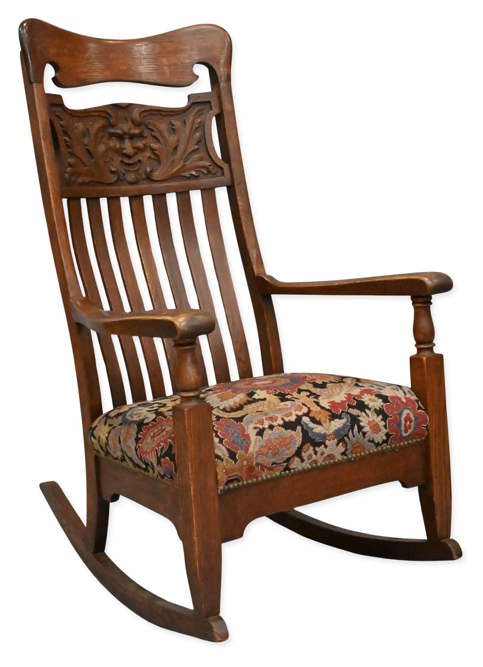 Victorian Oak Rocking Chair: Victorian Oak Rocking Chair having carved back and upholstery height 47 inches, width 27 inches