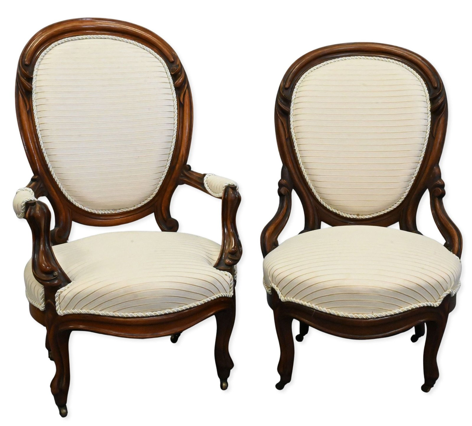 Pair of Victorian Ladies and Gentleman's Chairs: Pair of Victorian Ladies and Gentleman's Chairs each set on brass casters very clean upholstery height 44 inches, width 24 inches