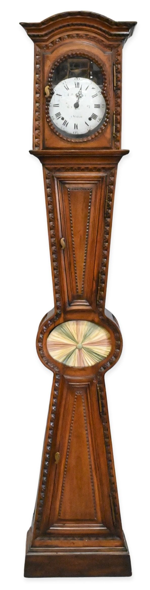 French Fruitwood Longcase Clock: French Fruitwood Longcase Clock having ornately carved head set on shaped body having two doors and a decorative fabric design in the center, along with two works: "A. J. Jeunet a Voroy and Vayssiere