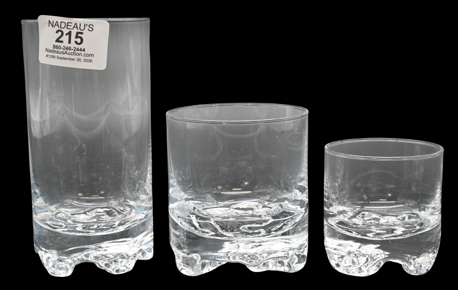 27 Piece Iittala "Gaissa" Glass Service: 27 Piece Iittala "Gaissa" Glass Service designed by Tapio Wirkkala in 1973, having textured rocky-form bases and thin clear glass walls, to include 7 tumblers, 12 double old fashioned glasses and 8