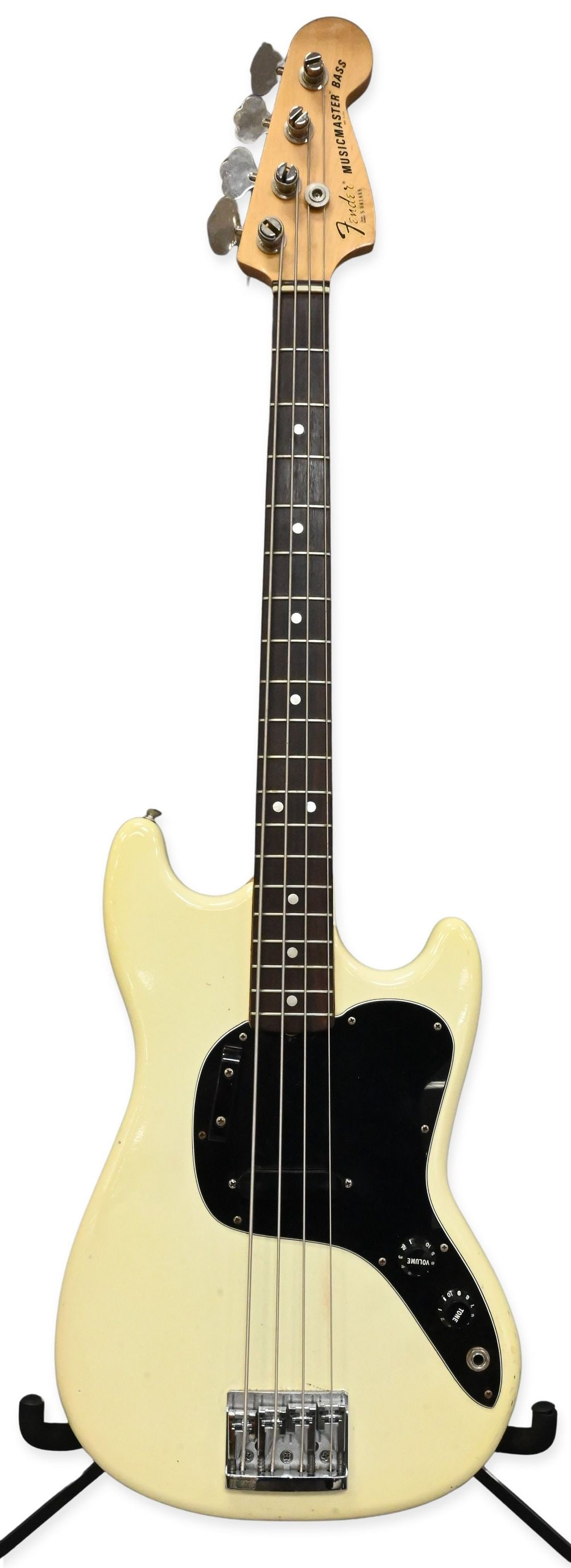1977/8 Fender Musicmaster Electric Bass: 1977/8 Fender Musicmaster Electric Bass having white finish, made in USA, serial number S841488. Along with Fender soft case