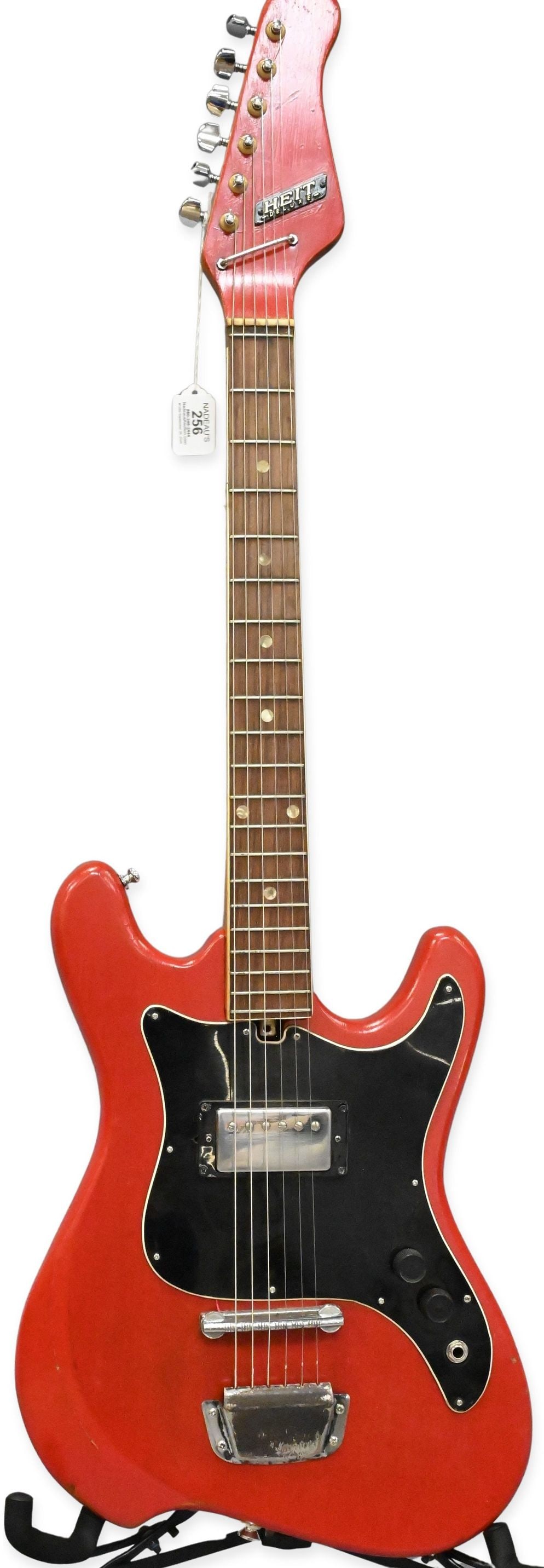 1960's Heit Deluxe Electric Guitar: 1960's Heit Deluxe Electric Guitar having red finish and steel reinforced neck, made in Japan. Along with hard case