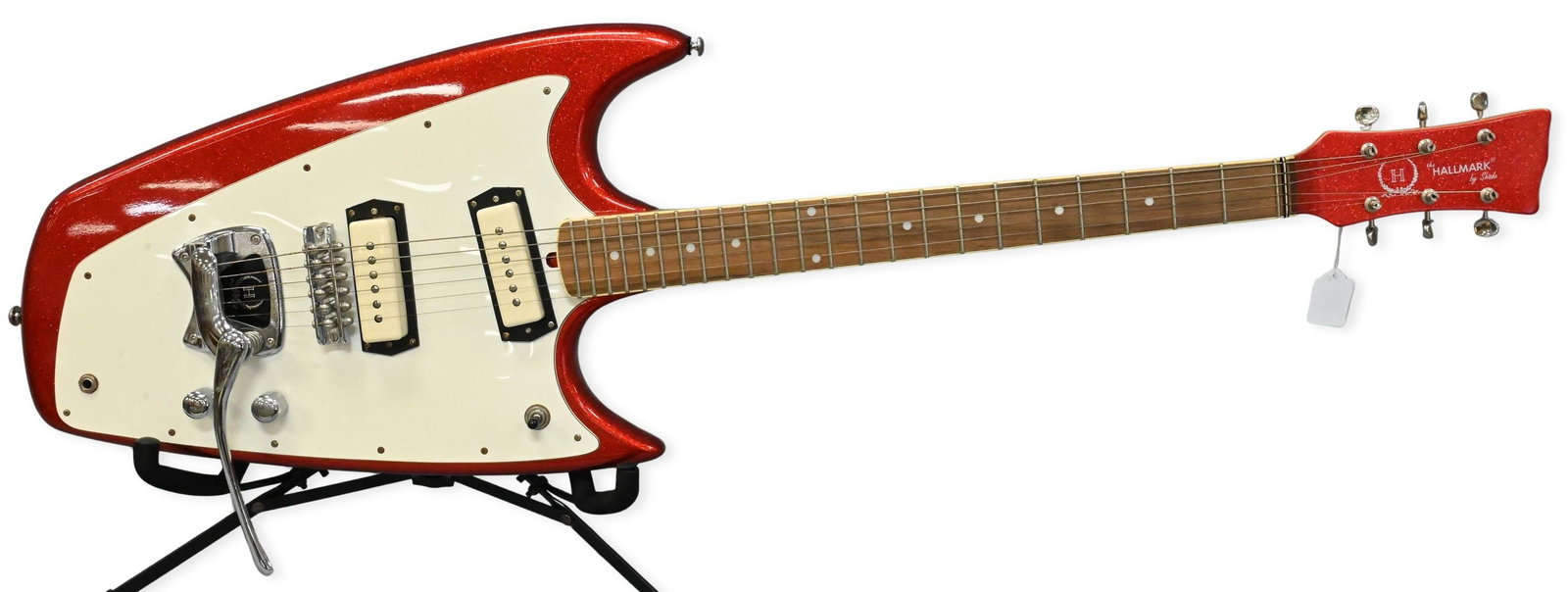 The Hallmark by Shade Swept Wing Electric Guitar: The Hallmark by Shade Swept Wing Electric Guitar having metallic candy apple red finish, serial number S040411321. Along with original hard case