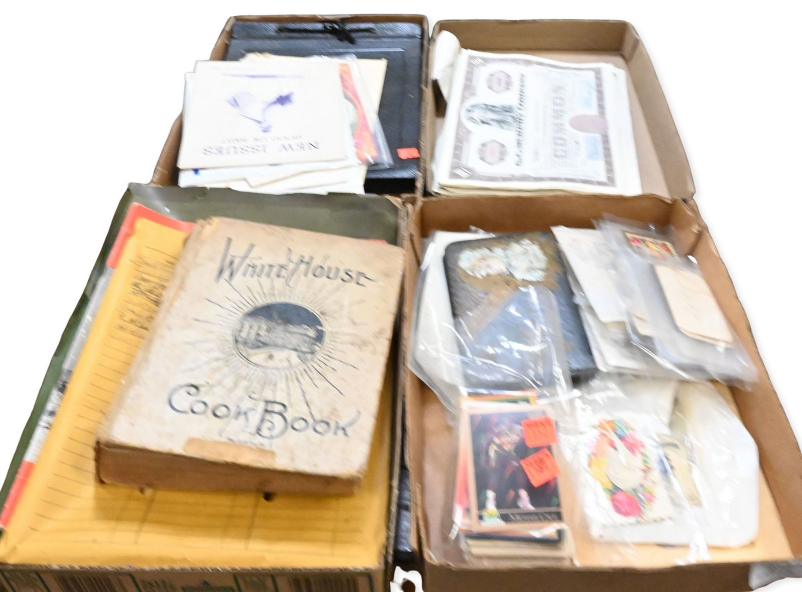 Collection of Ephemera: Collection of Ephemera to include group of stock certificates for G. C. Murphy Company, sports cards, black and white photo albums, autographs, and 1926 White House cookbook