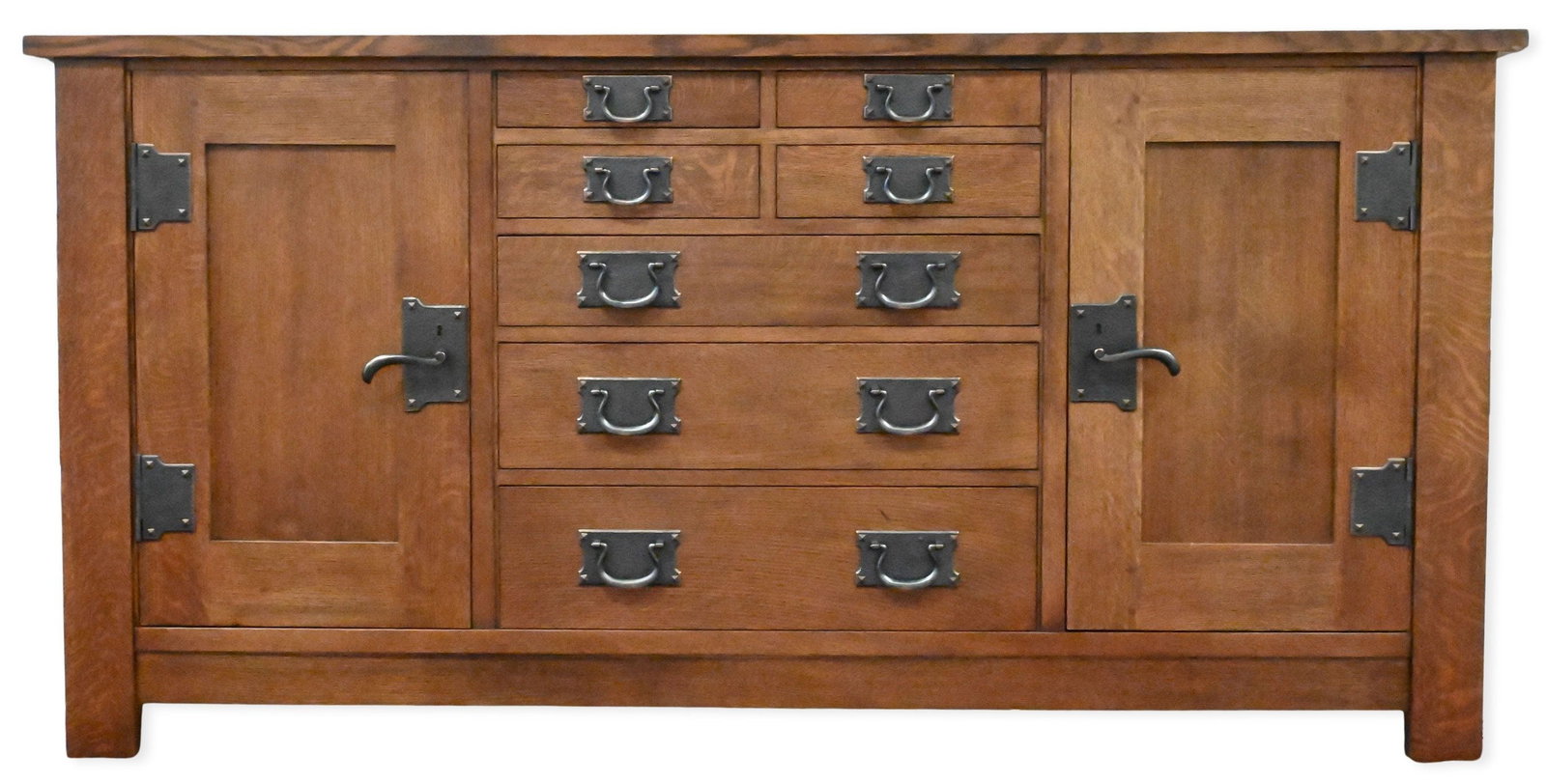 Stickley "Syracuse" Mission Oak Sideboard: Stickley "Syracuse" Mission Oak Sideboard having four short middle drawers over three long drawers, flanked by two doors opening to interior shelving, all having hand hammered hardware Retail price