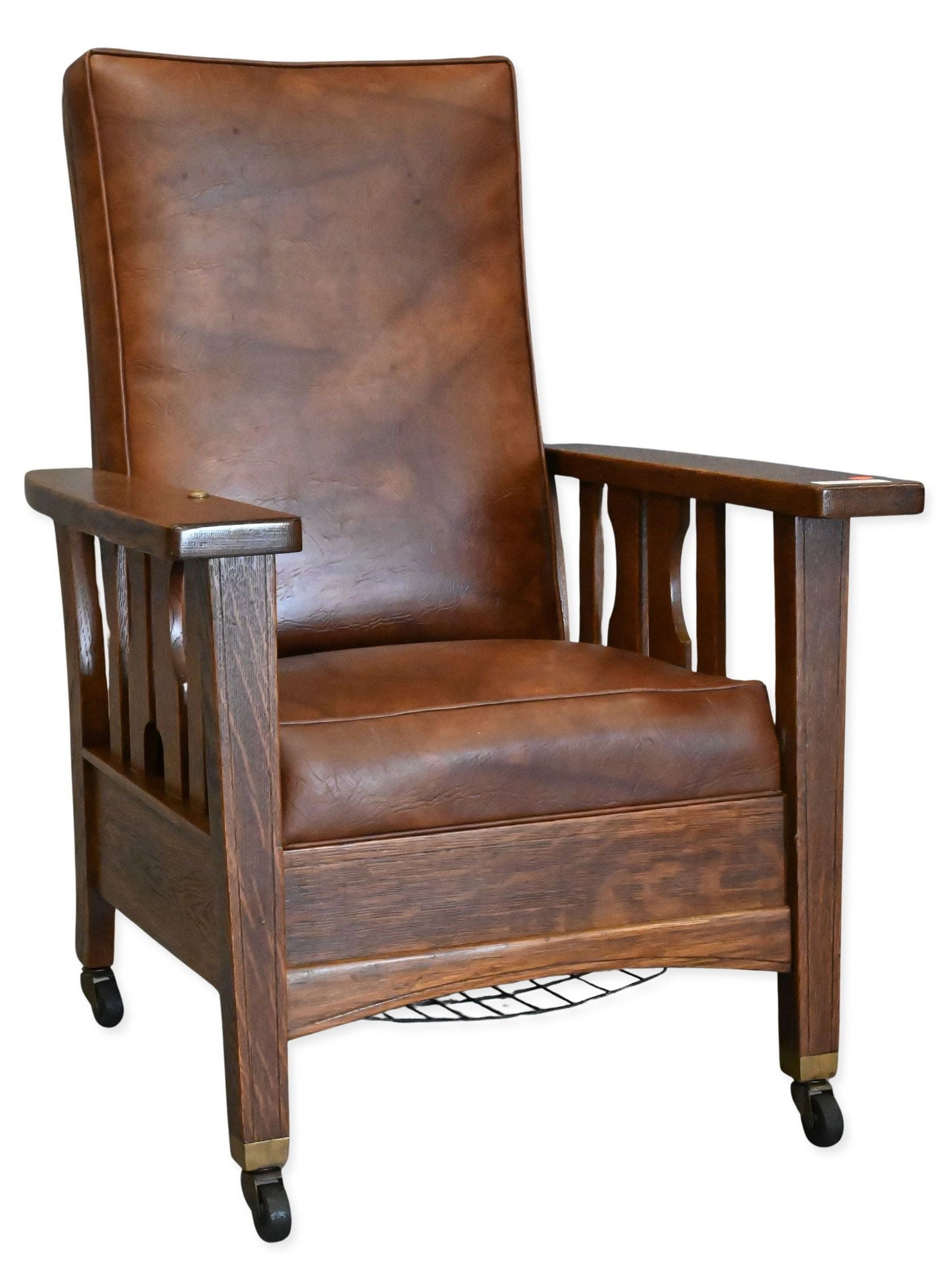 Royal Chair Company Mission / Arts & Crafts Style Reclining Armchair: Royal Chair Company Mission / Arts & Crafts Style Reclining Armchair constructed from quarter sawn oak and having leather upholstered cushions, set on casters height 40 inches, width 29.5 inches