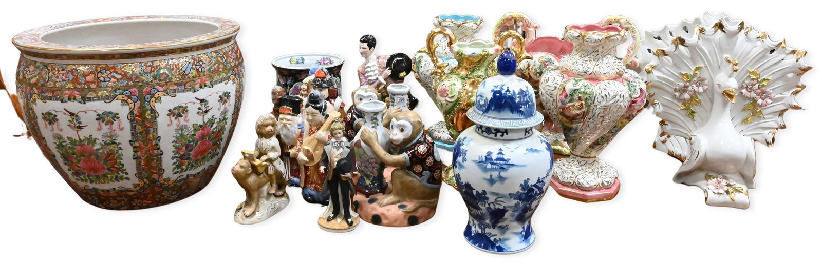 Group of Asian and Capodimonte Porcelain Decorative Porcelain: Group of Asian and Capodimonte Porcelain Decorative Porcelain to include large Chinese famille rose fish bowl jardiniere; blue and white covered temple jar; pair of Chinese porcelain monkey figures; f