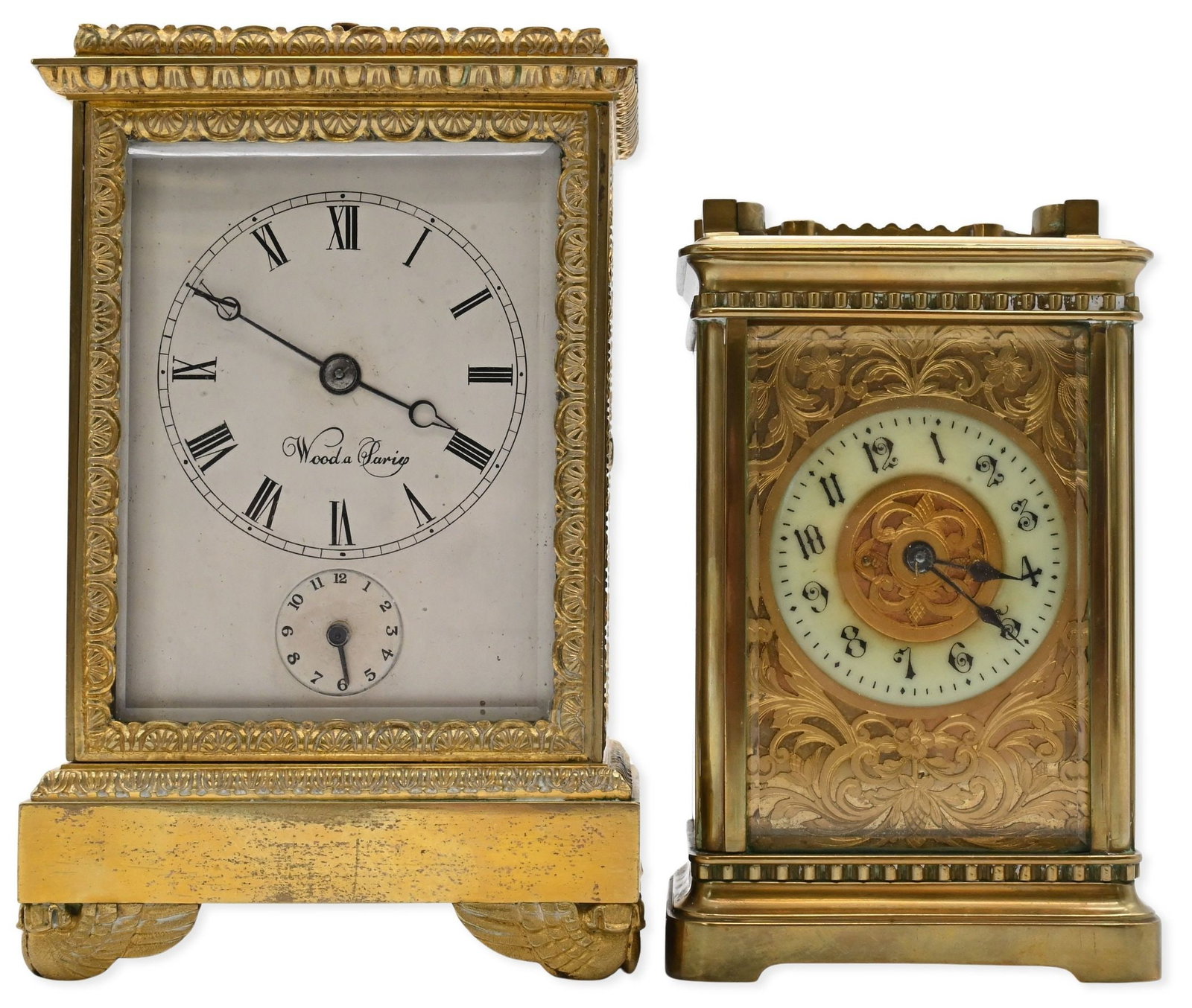 Two French Gilt Bronze Carriage Clocks: Two French Gilt Bronze Carriage Clocks to include one signed Woods, Paris, having white enamel Roman numeral dial, subsidiary seconds dial and ornate gilt bronze case; and one smaller gilt bronze and