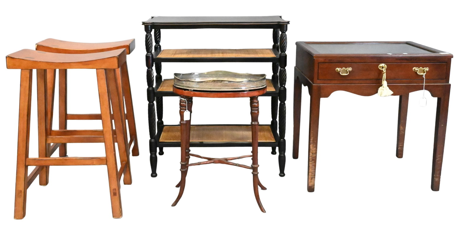 Five Piece Furnishings Grouping: Five Piece Furnishings Grouping to include a pair of stools, mahogany display case, stand with silver plate tag, along with four tier wood and rattan table