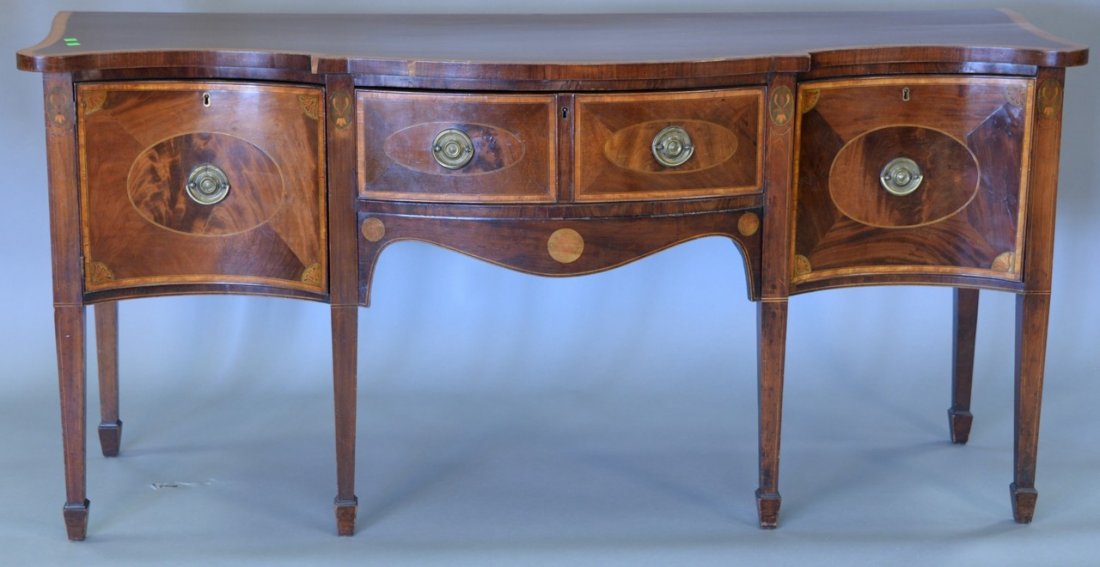 George III mahogany sideboard with panel and banded: George III mahogany sideboard with panel and banded inlays, circa 1800. ht. 35in., wd. 73in.
