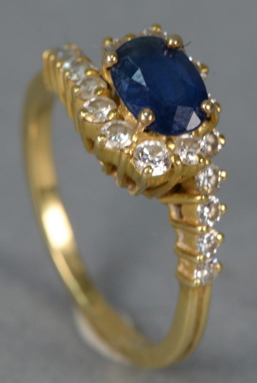 18K gold ladies ring set with center oval sapphire (1 of 4)