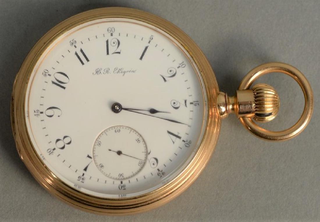 H.R. Ekegreen 18K pocket watch with open face, marked (1 of 5)