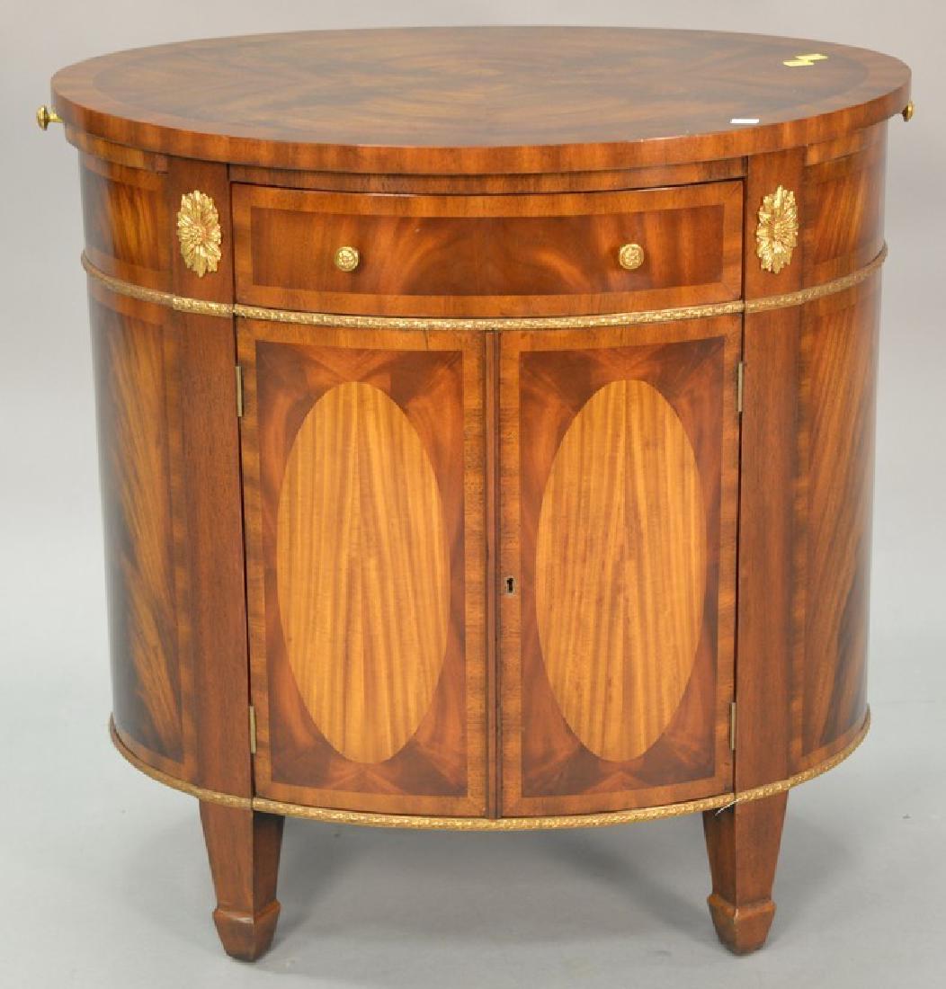 Maitland Smith oval cabinet with pull out slides. ht. (1 of 3)