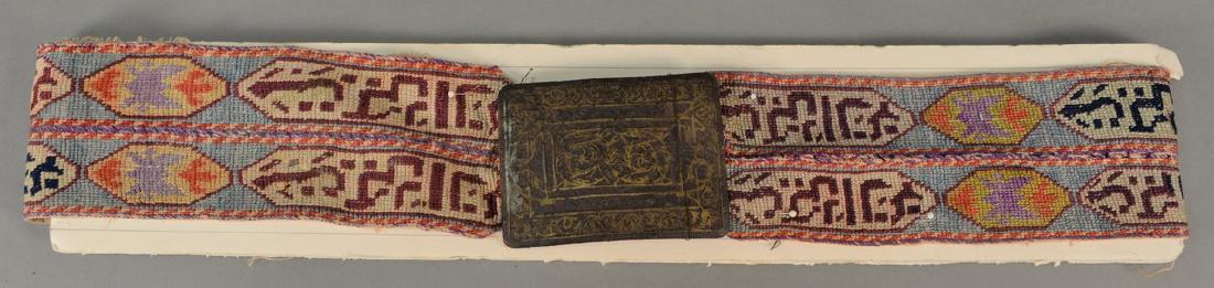 Needlepoint Middle Eastern belt with metal and gold: Needlepoint Middle Eastern belt with metal and gold color inlay chape. length 23 inches