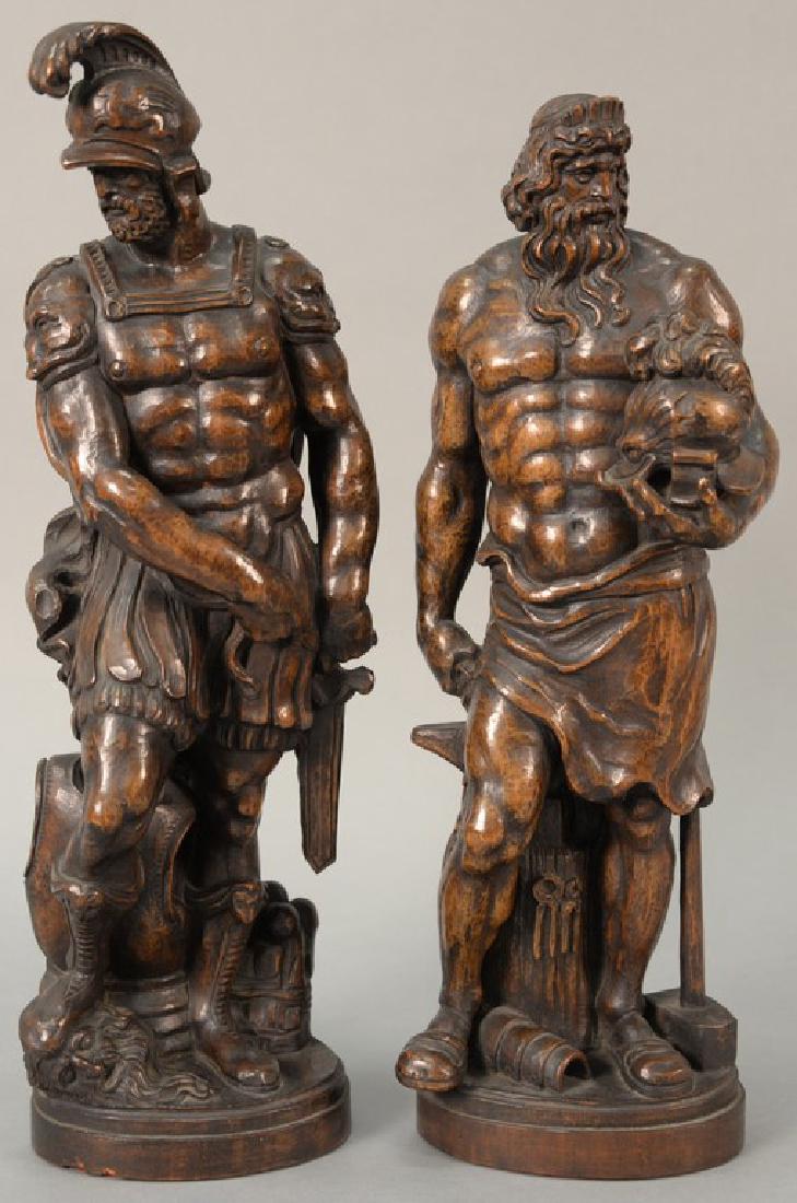 Pair of carved walnut Greek warriors, possibly black (1 of 6)