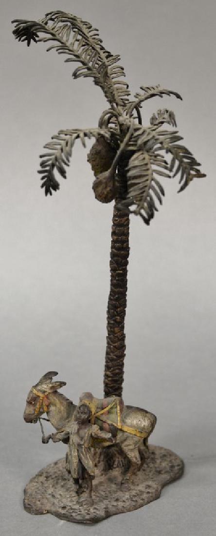 Geschutzt bronze palm tree with cold painted boy and (1 of 5)