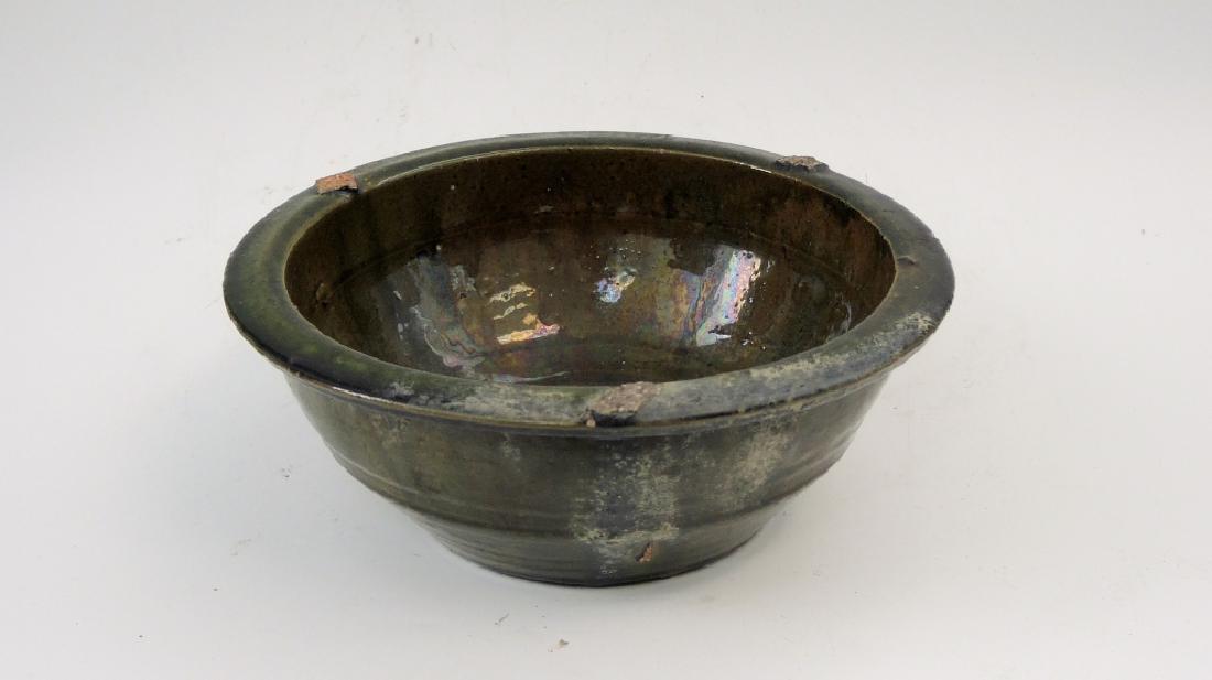 Antique Chinese Dark Green Glazed Bowl: Diameter: 8 5/8 in.; H: 3 1/2 in. Provenance: private Beverly Hills collection.