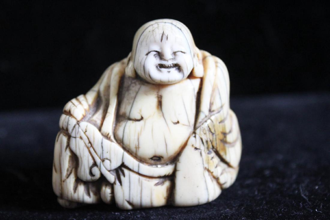 Hand Carved Buddha Smoke Filter (1 of 3)