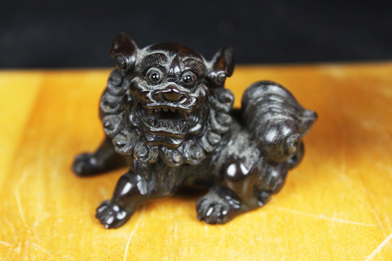 Hand Carved Black Lion Figure (1 of 3)