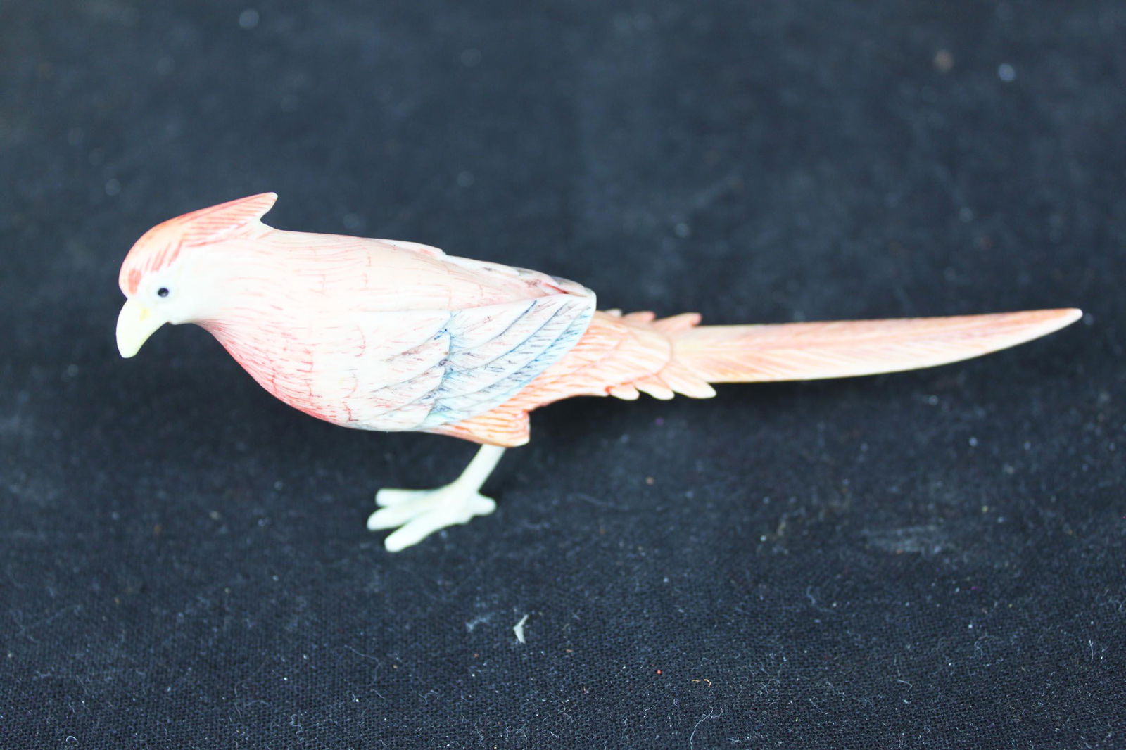 Hand carved bird figure (1 of 4)