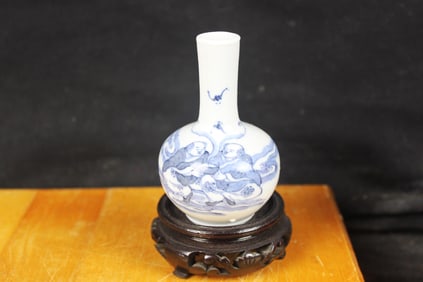 UNDERGLAZE BLUE AND WHITE PORCELAIN MINIATURE VASE