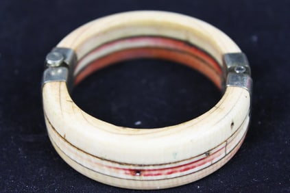 Hand carved bracelet w/ sterling silver and bone