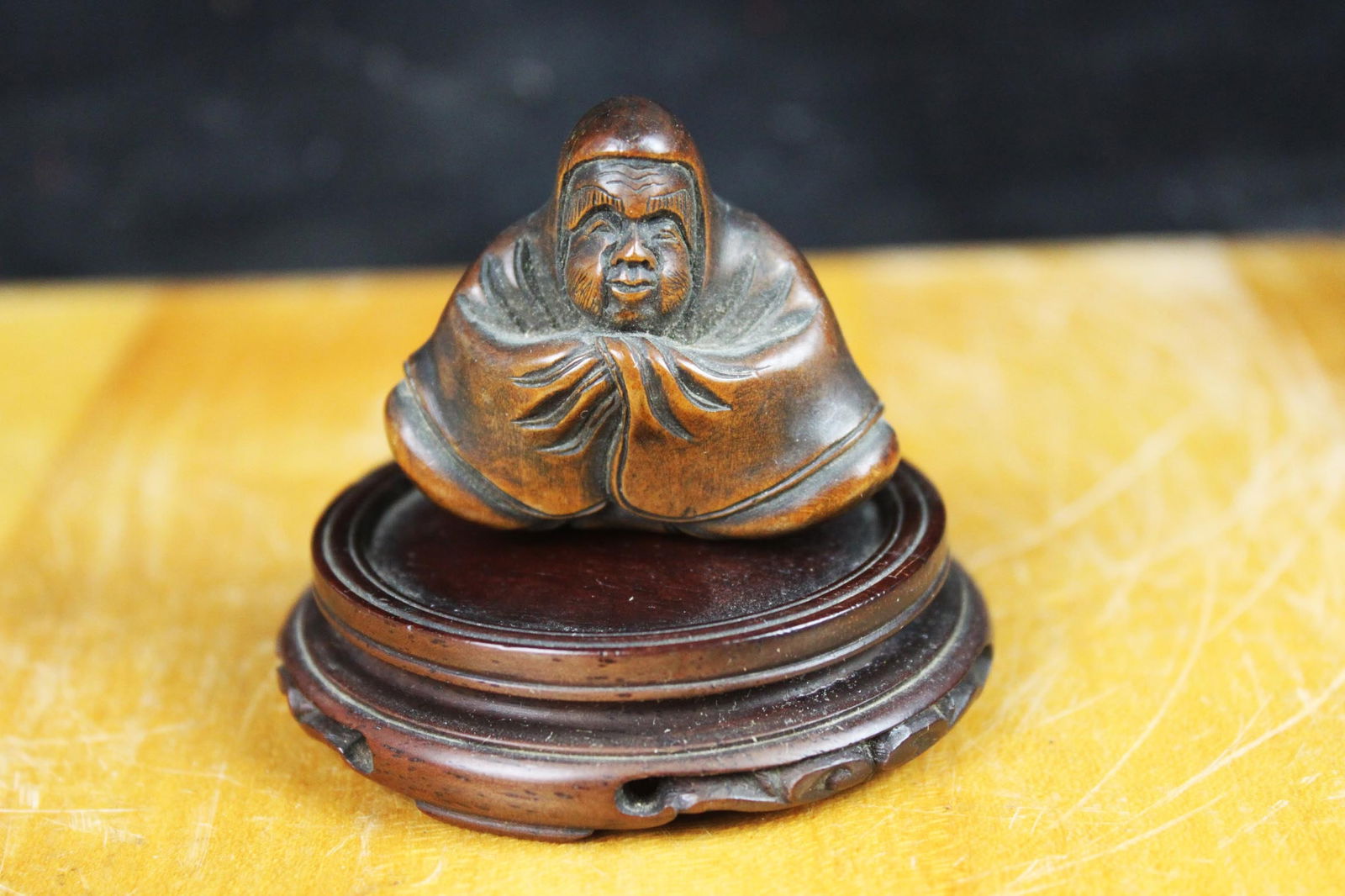 A wood netsuke of Daruma (1 of 7)