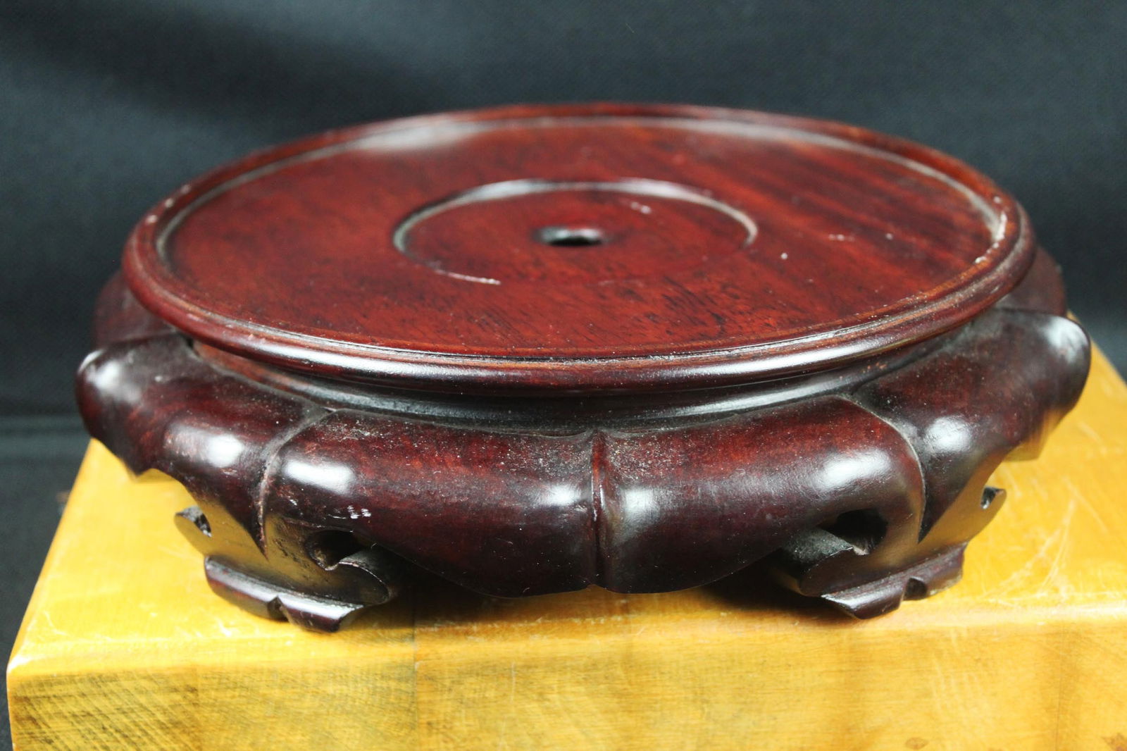 Chinese Carved Hardwood Display Stand for Vase or Bowl, Lotus-Form, 20th Century: 9''x2'' A finely carved Chinese hardwood display stand of circular form, featuring a raised central platform and a deeply carved lotus-petal style rim. The stand is well proportioned and designed to e