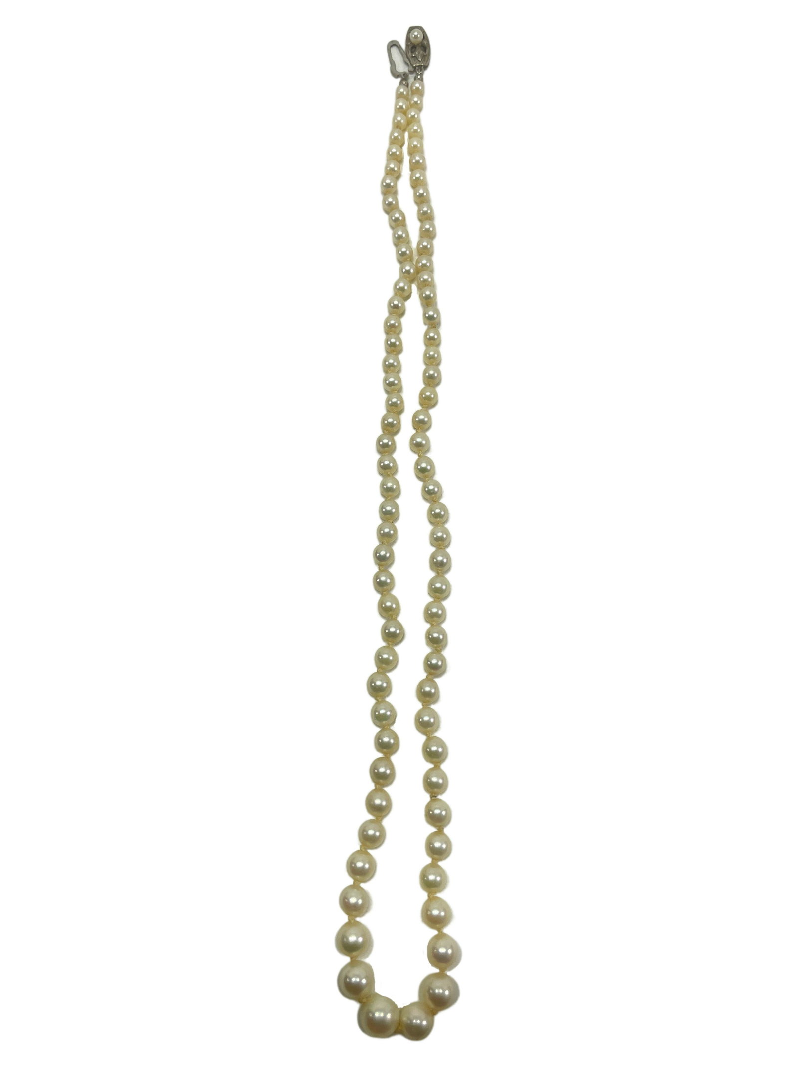 Vintage Mikimoto Pearl Necklace: Vintage Mikimoto Pearl NecklaceApprox. 20" long8mm graduated to 4mm PearlsWith Mikimoto markings on sterling clasp