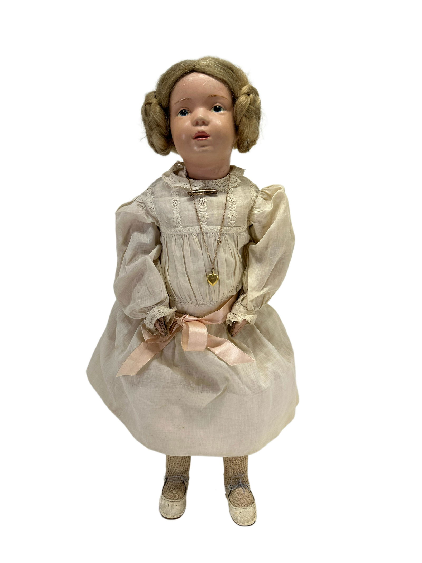 Antique Schoenhut Girl Doll: Antique Schoenhut Girl doll. Doll has some chipping and cracking on hands, commensurate with age. Doll is marked on back "Schoenhut Doll Pat. Jan. 17th 1911 U.S.A.", and is is 16" tall.
