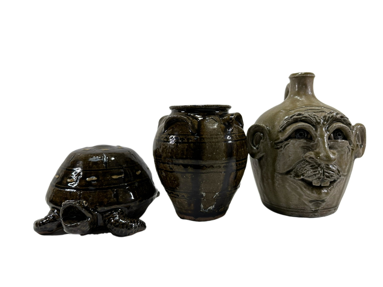 LOT OF 3 POTTERY PIECES: LOT OF 3 POTTERY PIECES. 2020 Clint Alderman Pottery Turtle thats signed on the bottom and it's 7" x 4.75" x 3.25". 2020 Clint Alderman Pottery Vase thatâ€™s signed on the bottom rim of the vase 