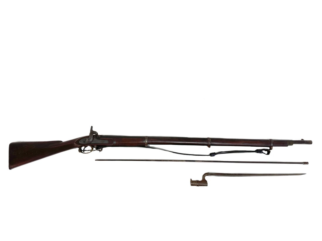Interesting British Barnett London Musket: Interesting British Barnett London Musket. This interesting musket has attached bayonet. Stock is carved with "B.T.W. Cok 44th NCT" 3 iron bands, possible Confederate related. Illegble markings on but
