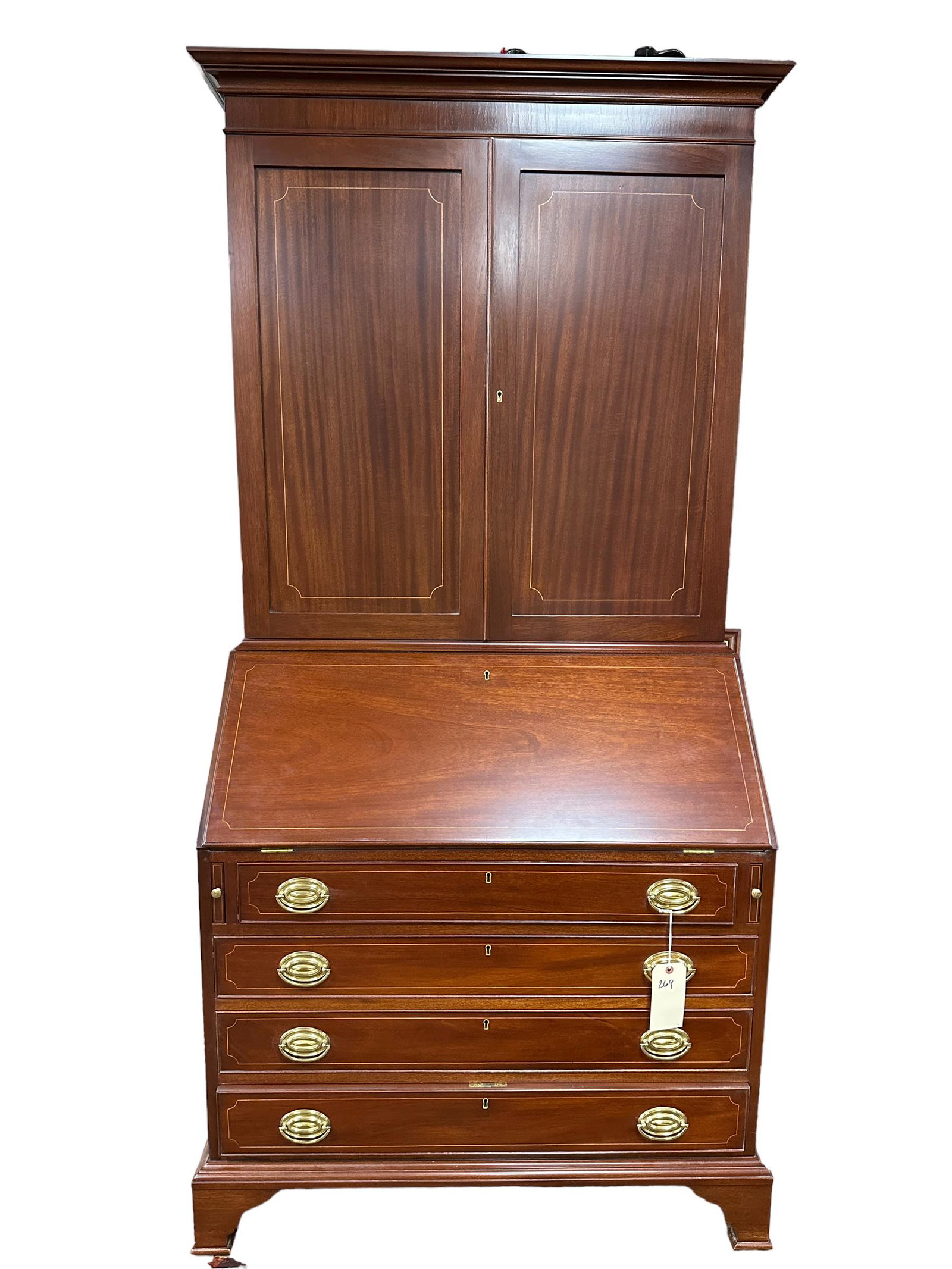 Biggs Slant Top Secretary: Biggs Slant Top Secretary. Has key. Measures 81" x 38" x 21.25"