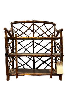 Twig Art Hanging Shelf: Twig Art Hanging Shelf. Measures approx. 26.25" Height x 22" Width x 8" Depth. This qualifies for in-house shipping.