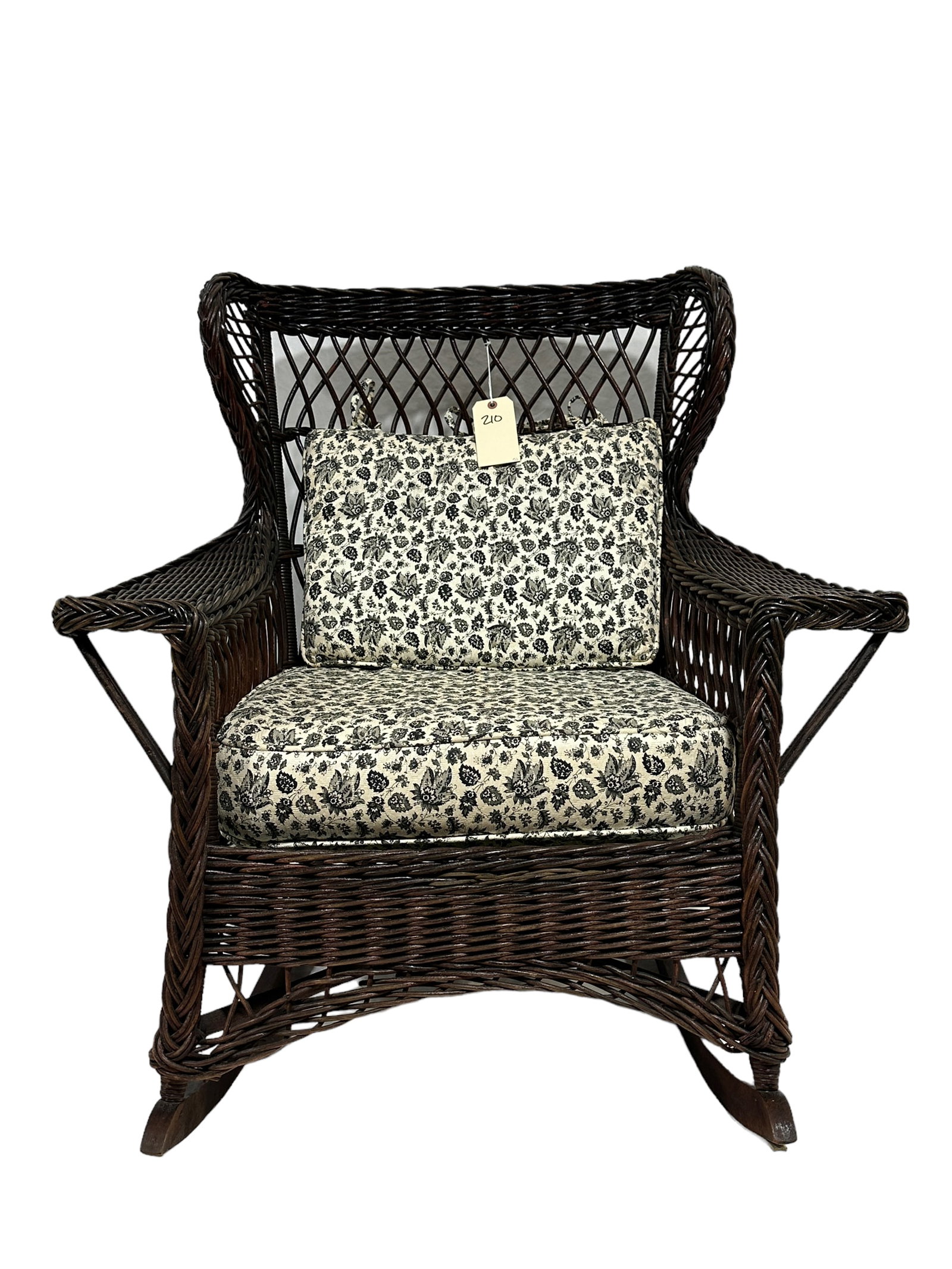 Wicker Rocker: Wicker Rocker. Measures 38.25" Tall. This does not qualify for in-house shipping.