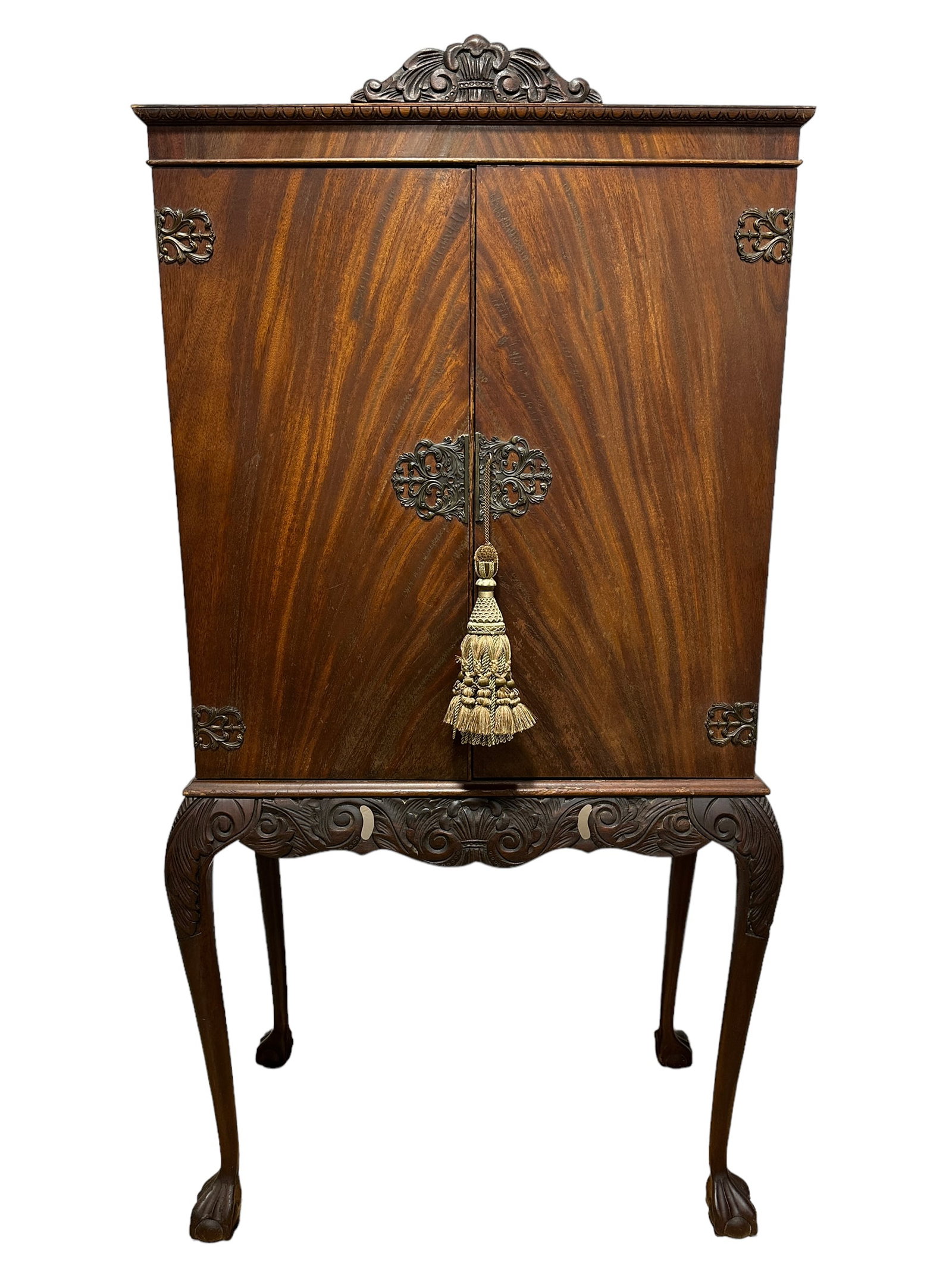 Antique Wood Carved Cocktail Cabinet: Antique Wood Carved Cocktail Cabinet, has its key. Measures 66" H x 17.5" W x 34" D.