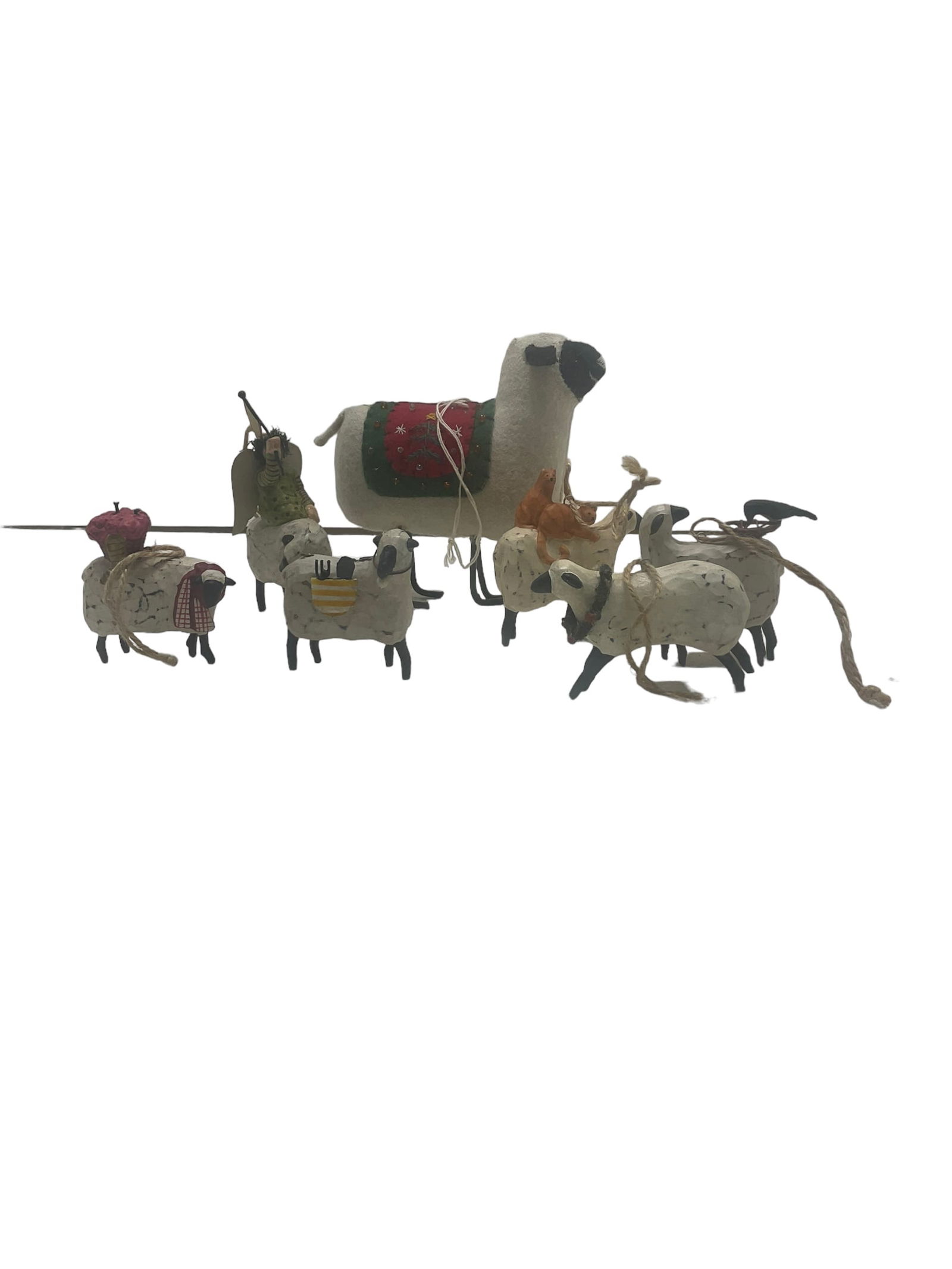 Lot of 7 Sheep Ornaments: Lot of 7 Sheep Ornaments. Measure 2" to 4.5" tall. One of the set of 6 is missing string. The largest sheep is hand stitich needlework